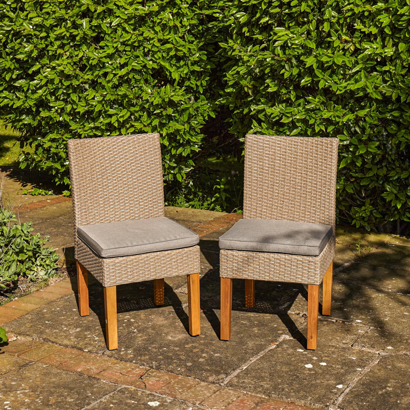 Parina 4 - Person Wood Patio Dining Set with Extendable Rectangular Table , Cushions Included