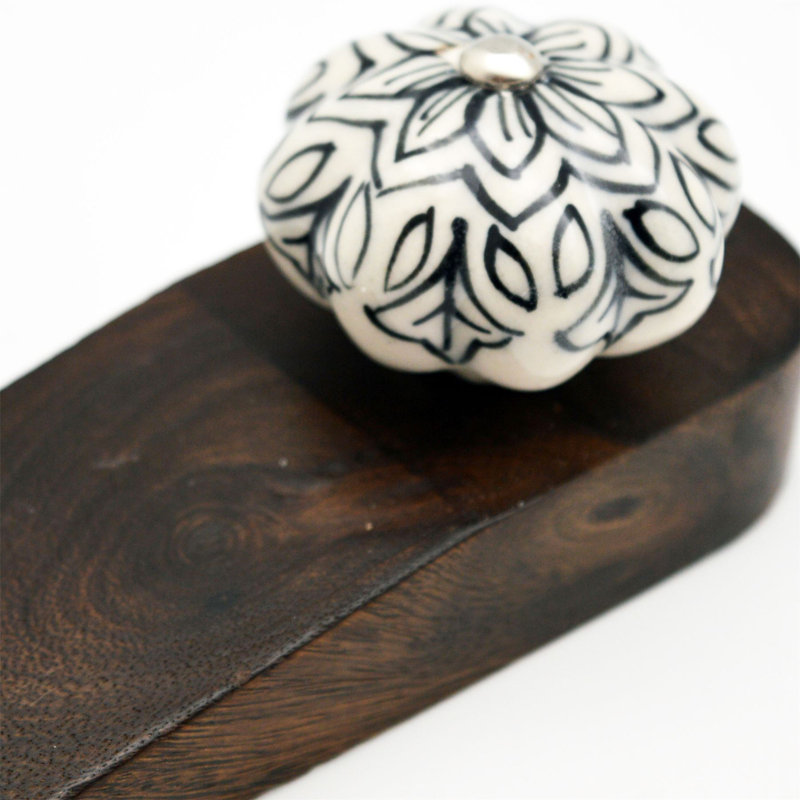 Nicola Spring - Wooden Door Stop - Black Flower