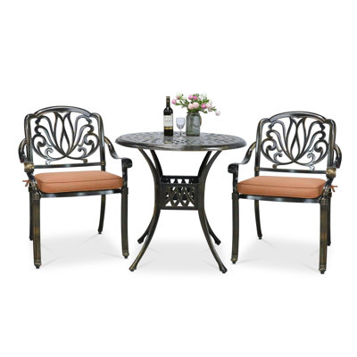 Djako 2 - Person Patio Dining Set Umbrella Hole Included Round Table with Cushions Included