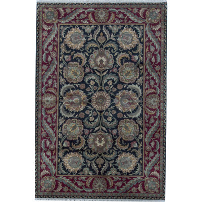 Tapis noir et rouge de haute qualité noué à la main