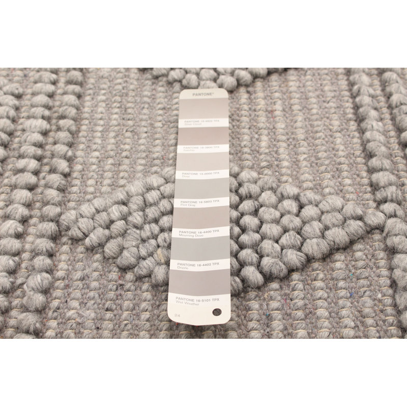Tapis gris géométrique en laine tressé à la main