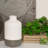 Stoneware Round Bottle Vase with Small Mouth, Short Neck and Grey Banded Rim Base SM Matte Finish White