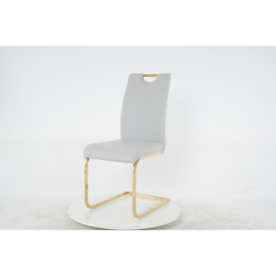 Chaise de salle à manger rembourrée à dossier Taurius