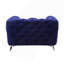 Fauteuil en velours bleu