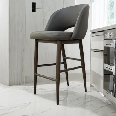 Tabouret Xaedyn classique en cuir de style Mid-Century moderne, bien que fabriqué