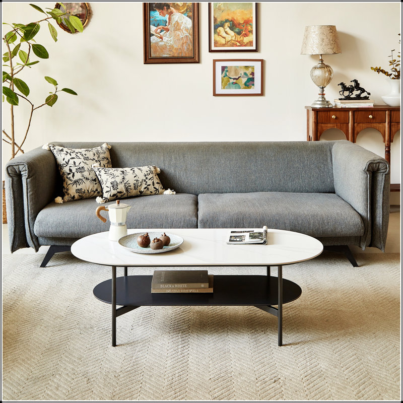 Table basse en MDF à double couche en céramique avec structure en acier, parfaite pour l'élégance et la fonctionnalité du salon moderne.
