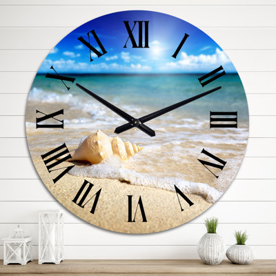 Grand coquillage dans le sable II - horloge murale nautique et côtière