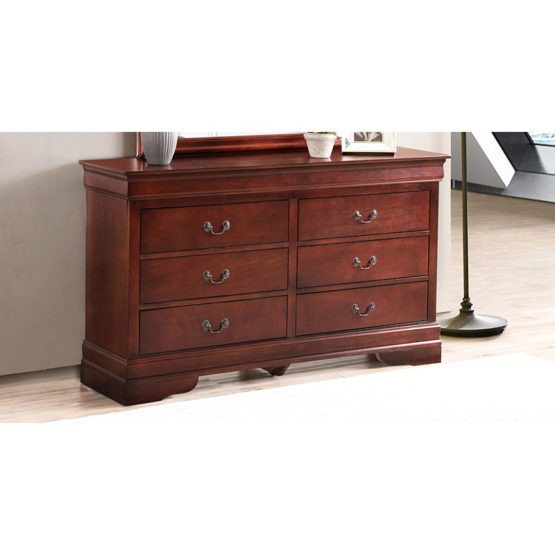 Superbe commode en cerisier avec des pièces en métal attrayantes dans un style traditionnel - Meubles