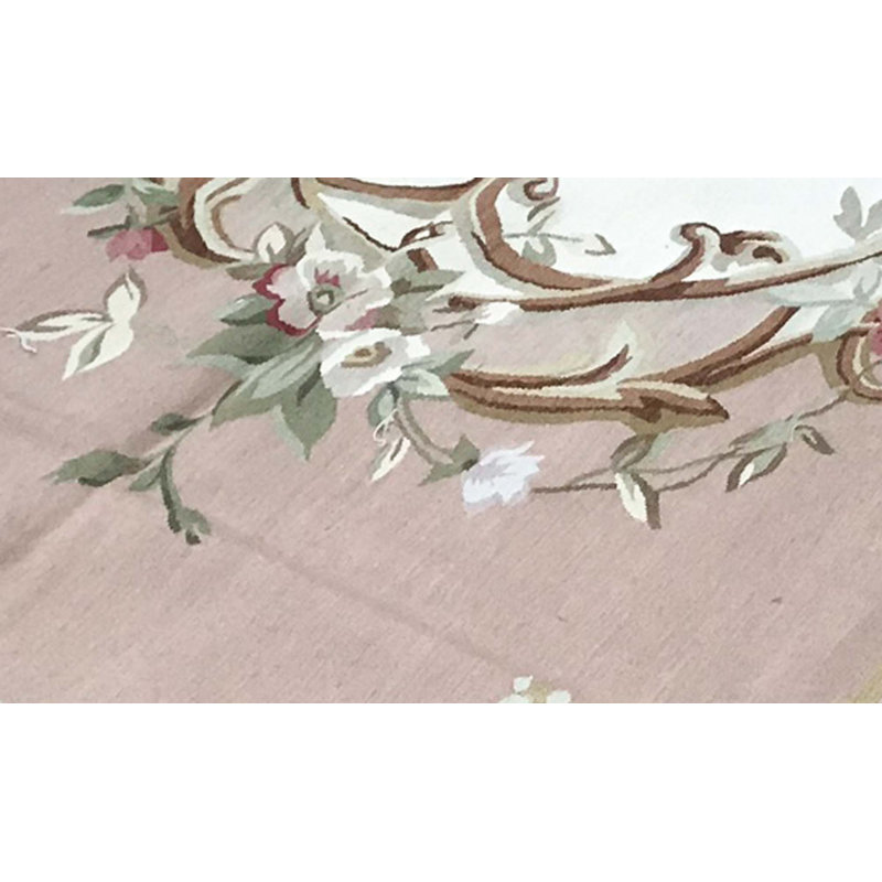 Tapis rose et ivoire de haute qualité noué à la main