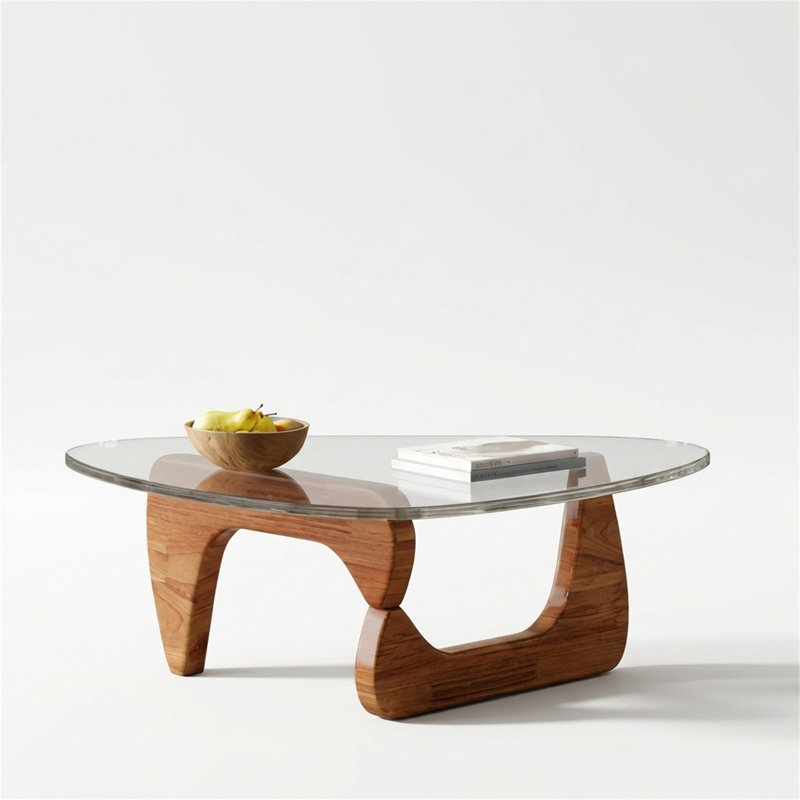 La base en noyer, combinée à une table basse en verre robuste, convient non seulement aux salons, mais aussi aux chambres à coucher, aux espaces de réception et aux espaces de bureau.