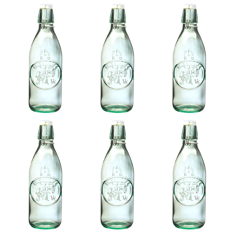 Ensemble de six bouteilles en verre embossées