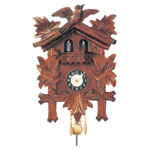 Horloge murale coucou sculptée