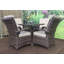 Bernelle 4 - Person Patio Dining Set Umbrella Hole Included Round Table with Cushions Included