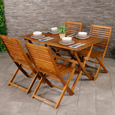 Antonio 4 - Person Acacia Wood Patio Dining Set with Rectangular Table