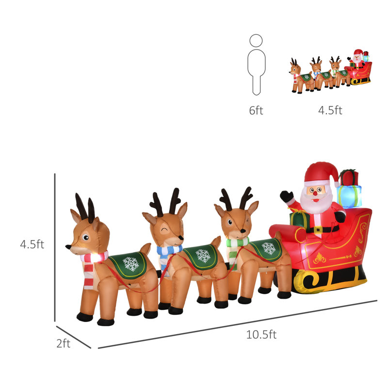 Décoration de Noël avec père Noël sur traîneau et 3 cerfs gonflables