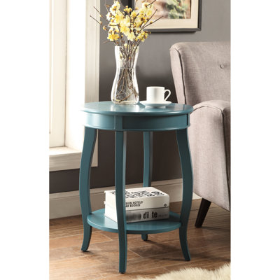 Table en bois avec tablette inférieure de rangement et accent sur les pieds bleu sarcelle