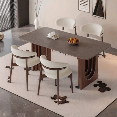 Dining table and chair set with rock slab.