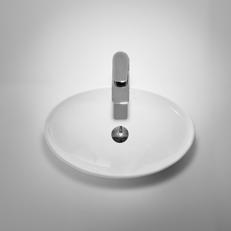 Lavabo de salle de bain ovale en porcelaine vitreuse avec trop-plein