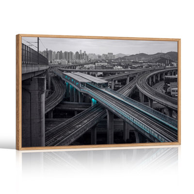 Elevated Train Tracks With Cyan Lights And Gray Cityscape Canvas Wall Art