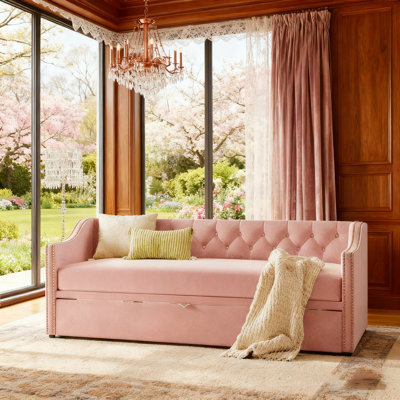 Upholstered daybed with Pop Up Trundle