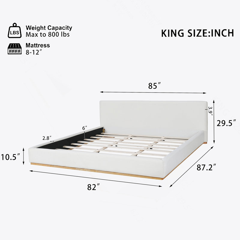 Élégant lit rembourré avec structure en bois massif, libérant une nouvelle expérience de sommeil confortable, très grand, blanc