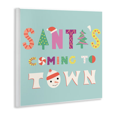 Plaque murale fantaisiste «Santa to Coming Town», design par Sazerelli Designs