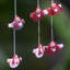 Figurine suspendue en bois anges rouge