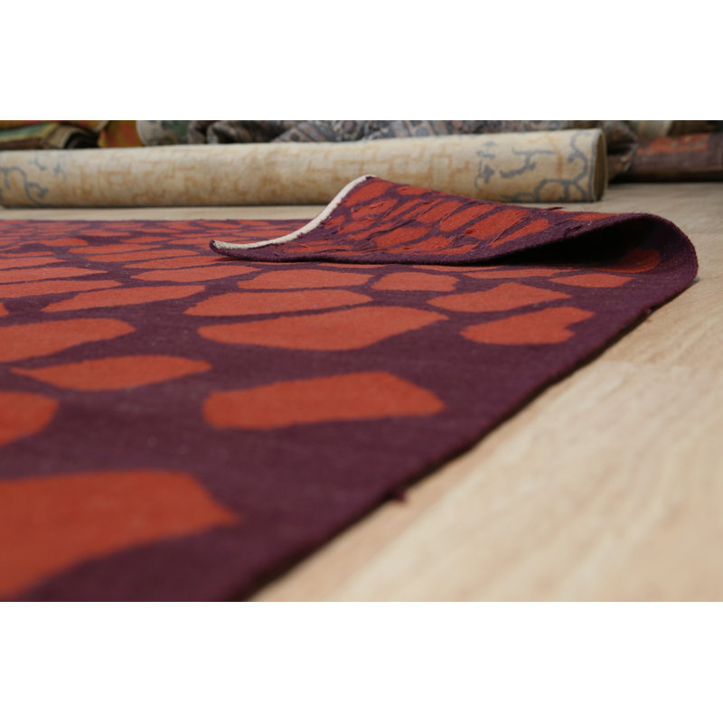 Dwendolyn Orange Flatweave Wool Area Rug