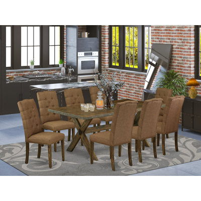 L'ensemble de table de cuisine 9 pièces comprend une table de salle à manger rectangulaire avec pieds en X et 8 chaises de salle à manger Parson en tissu brun