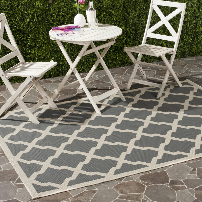 Joyner Geometric Hand Woven Indoor / Outdoor Area Rug, Rectangle 160 x 231 cm