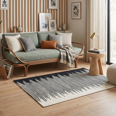 Tapis noir et ivoire Cadence