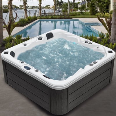 Spa pour 4 personnes à 36 jets à 72 ports Surfaces® avec Bluetooth, chauffage en acier inoxydable, éclairage à DEL programmable, housse isolée incluse