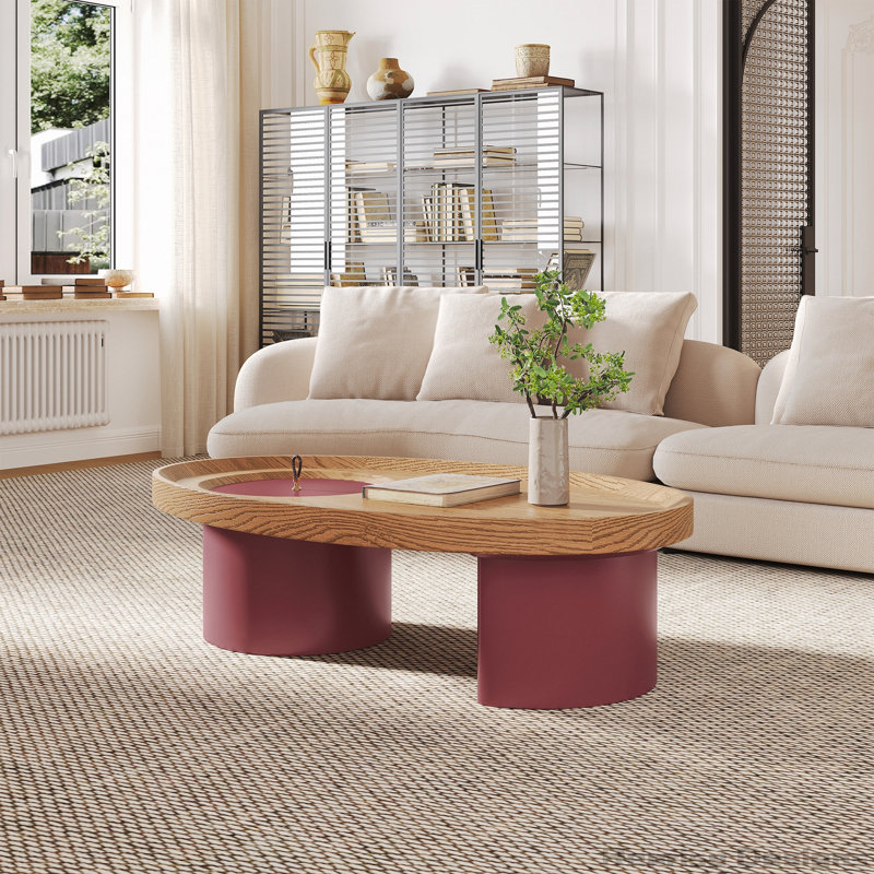 Table basse ovale 45,3 po avec plateau en noyer, pieds rouges et rangement caché