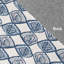 Tapis bleu à motif géométrique-1733182424