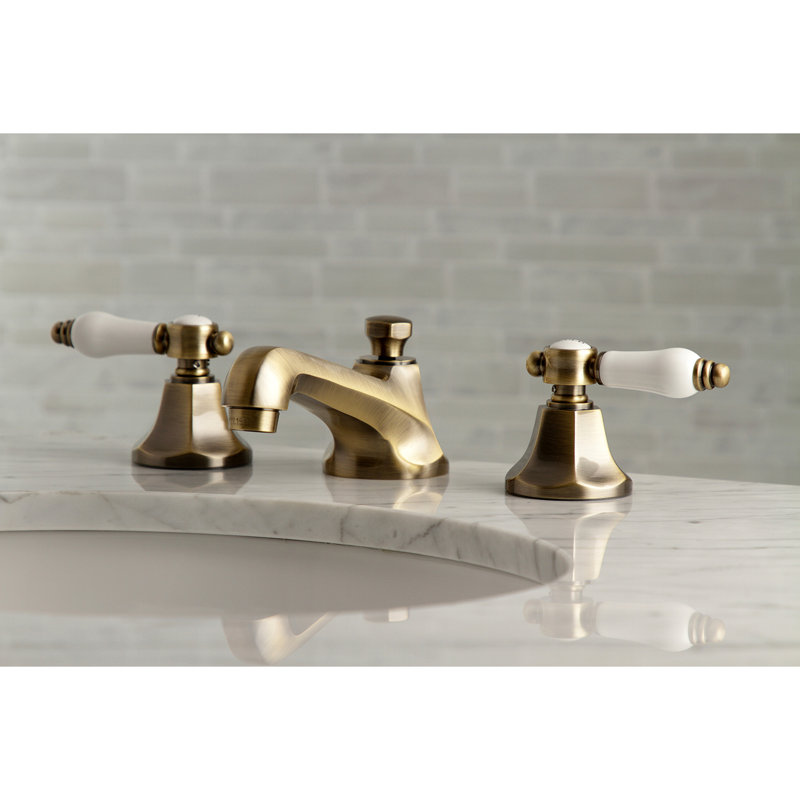 Kingston Brass Bel-Air Two-Handle 3-Hole Deck Mount Widespread Bathroom Faucet with Brass Pop-Up Drain, Antique Brass
