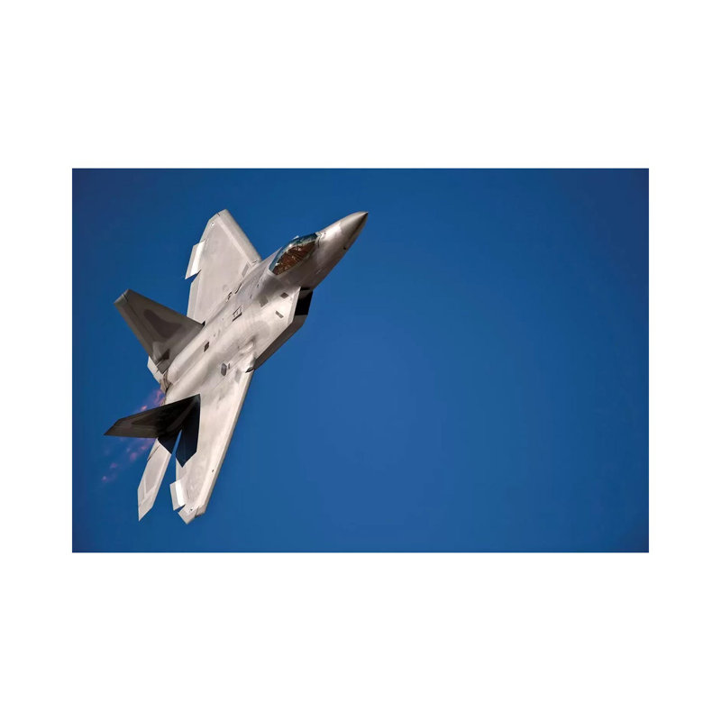 An F-22 Raptor Aircraft Performs During Aviation Nation 2010 by Stocktrek Images - Wrapped Canvas Print