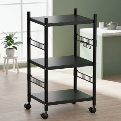 This Three-Tiered Multi-Functional Microwave Oven Rack Storage Trolley Features Four Omnidirectional Wheels And Four Detachable Hooks, And Is Equipped by 17 Stories