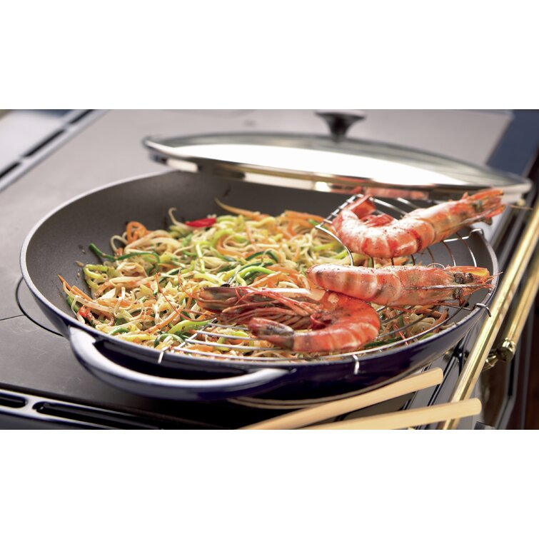 https://assets.wfcdn.com/im/12641619/resize-h755-w755%5Ecompr-r85/4466/44665672/Chasseur+Enameled+Cast+Iron+Wok+Set+with+Lid.jpg