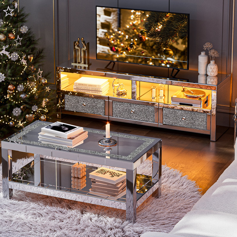 Meuble télé Mercer41 avec miroir, 3 tiroirs et 2 espaces de rangement ouverts, couleur argent effet diamant, compatible avec les téléviseurs jusqu'à 85 pouces et plus.