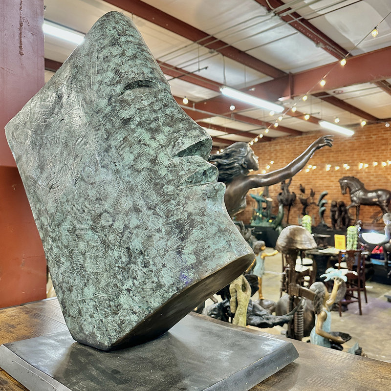 Bronze Book Face Sculpture