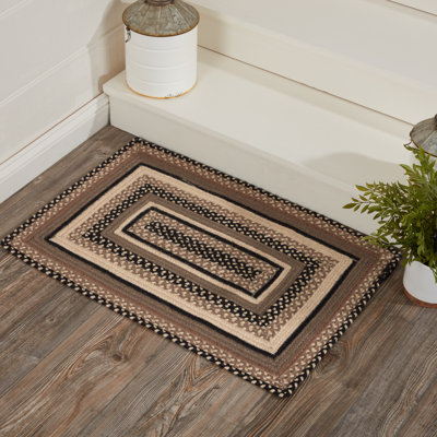  Tapis noir / gris à motif géométrique en jute tressé