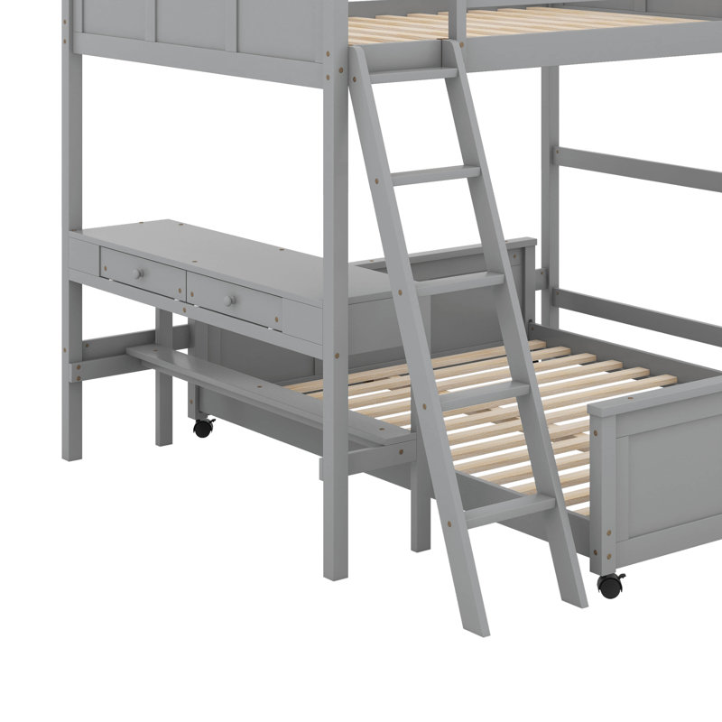 Lit double superposé au dessus d'un lit double avec bureau