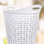 Panier à linge flexible en osier-63702409