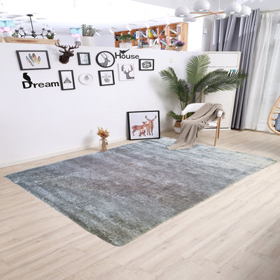 Itzel Camouflage Area Rug