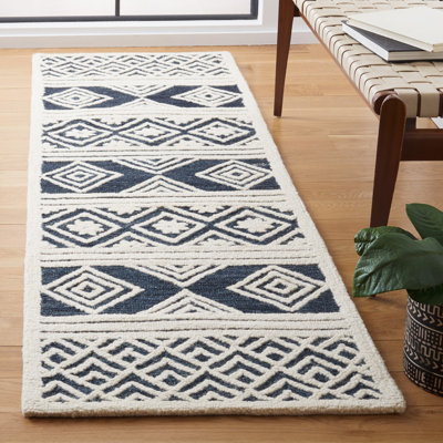 Tapis rayé ivoire / bleu en laine / coton touffeté à la main Brizendine