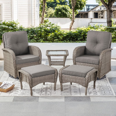 Keywest 2 - Person Outdoor Seating Group PE Wicker Swivel Glider With Ottomans With Cushions With Side Table