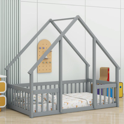 Lit moderne en forme de maison moderne avec clôture et garde-corps