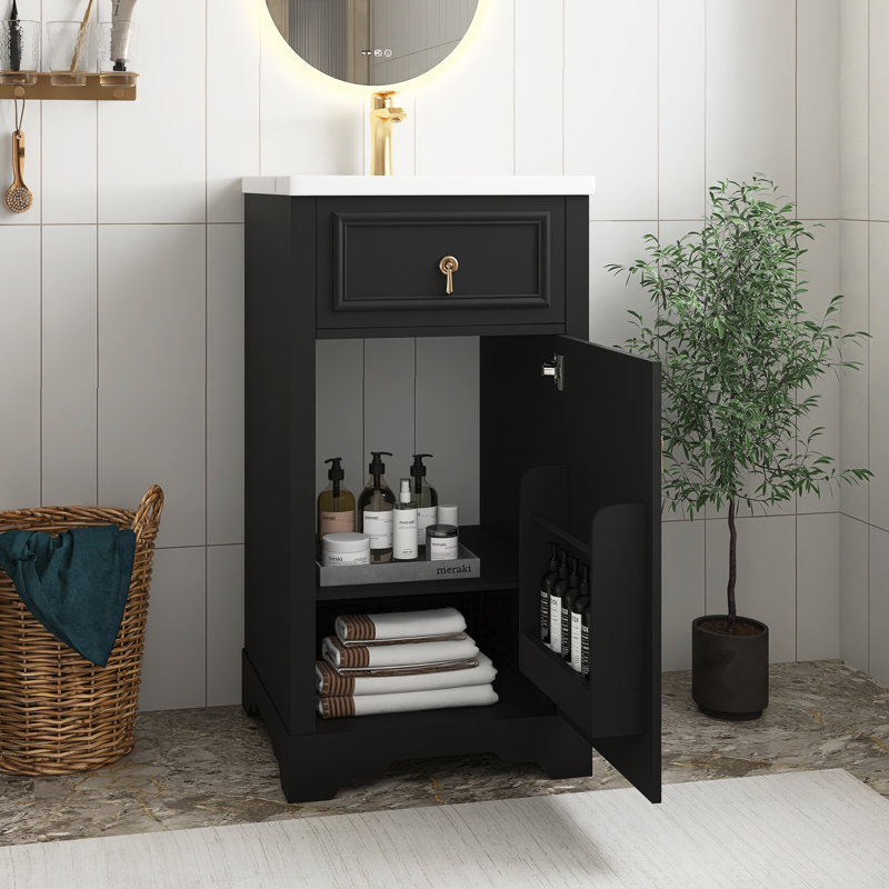 Meuble-lavabo noir en panneau de fibres à densité moyenne de 20 po avec lavabo en céramique, porte à fermeture douce, tablette réglable et support de rangement fixé à la porte