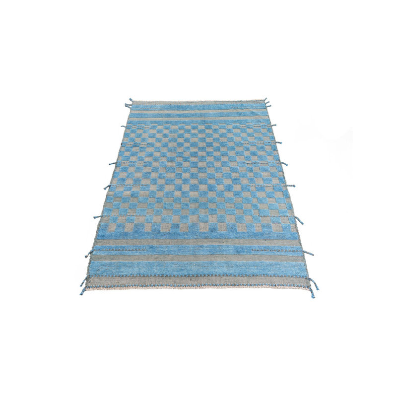 Tapis bleu Kalmanovitz