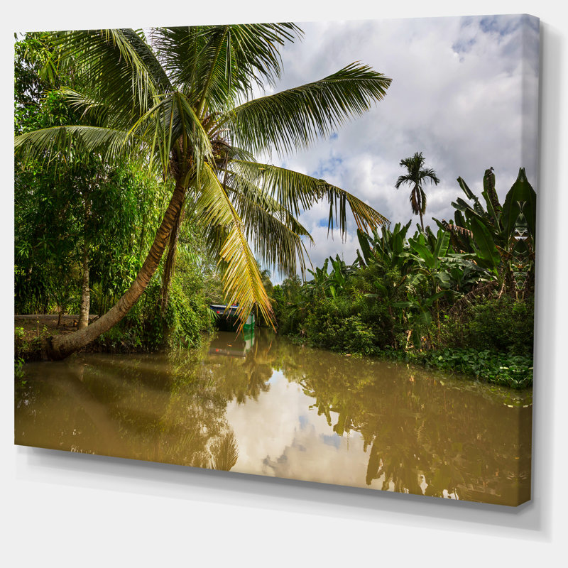 «Tropical River with Bent Coconut Palm», reproduction de photo sur toile tendue, H 16 po x l 32 po